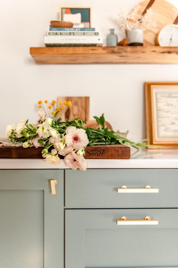 flowers on top of a countertop.