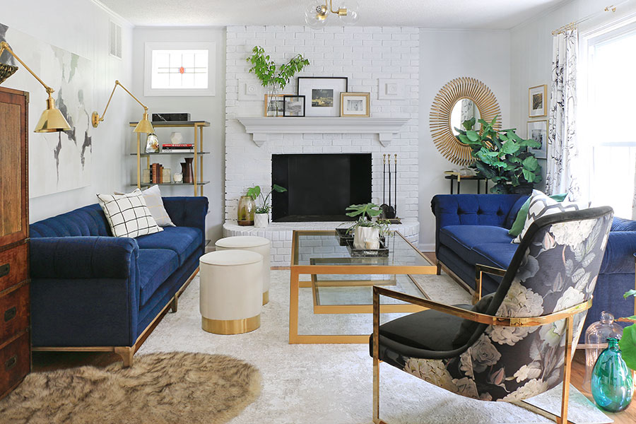 family room with white walls and jewel-colored furniture.