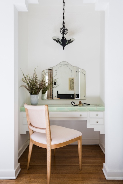 original vanity with green tiles.