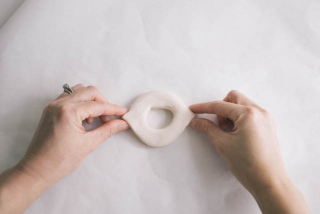 Pinch the sides into points to form an eye shape.