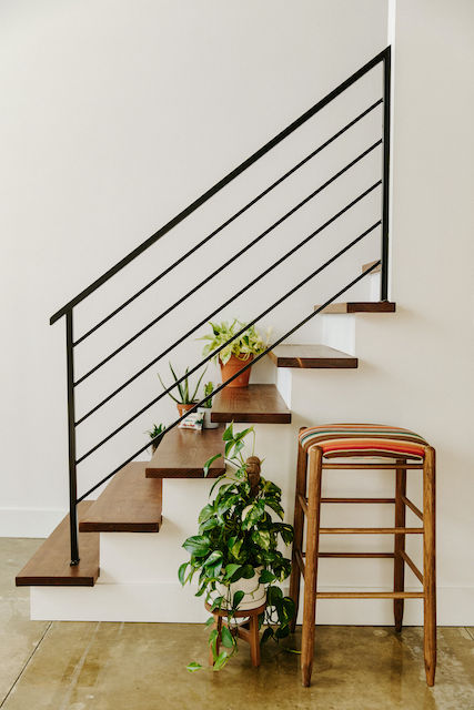 stairs after the renovation are against the back wall