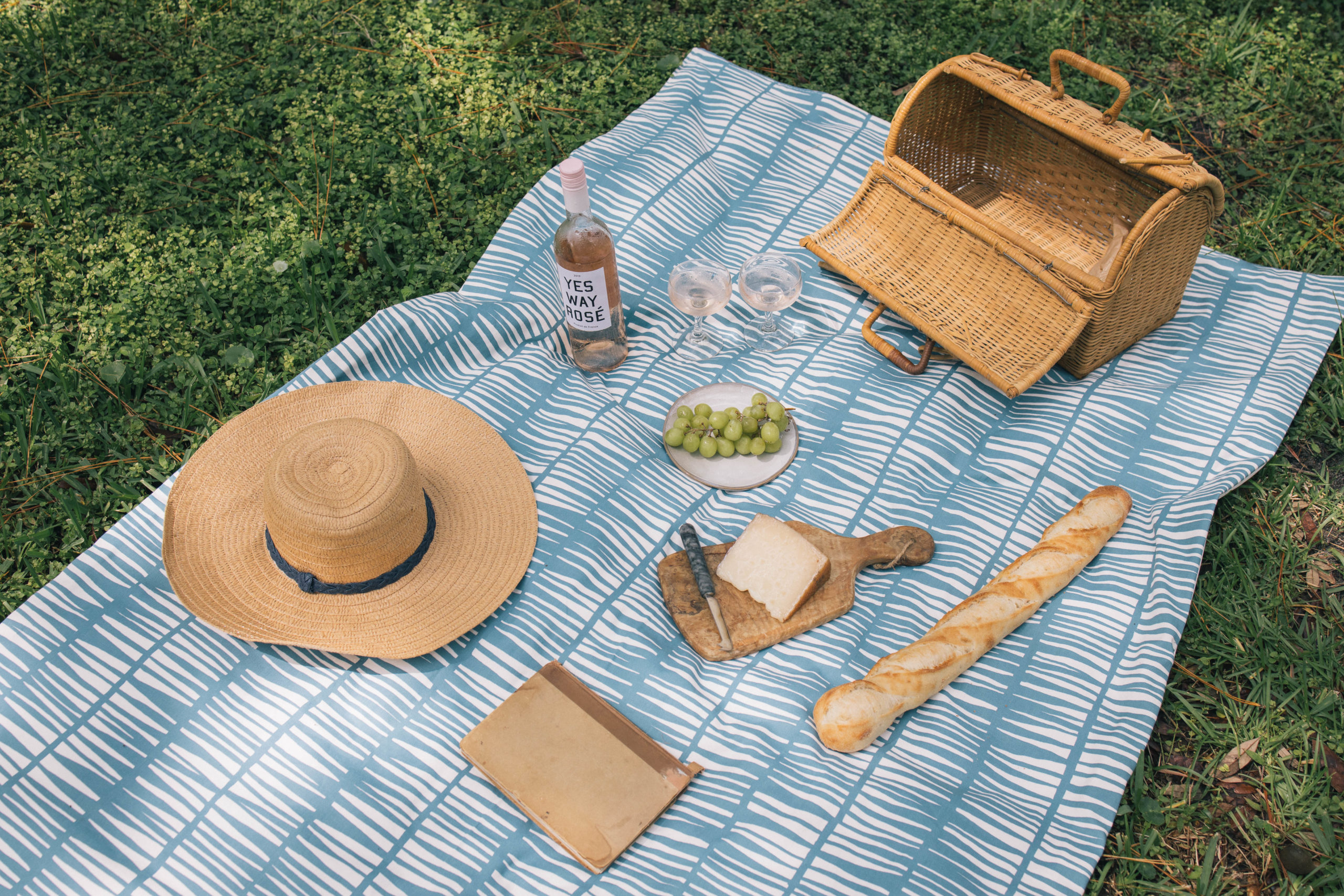 picnic with food on the blanket