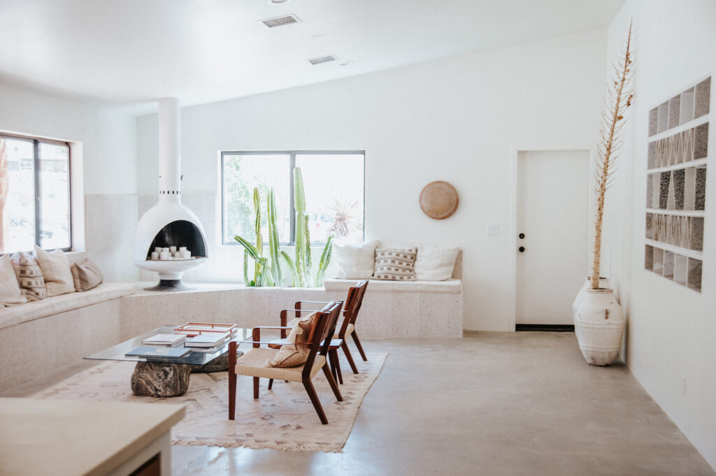 Midcentury fireplace in white living room