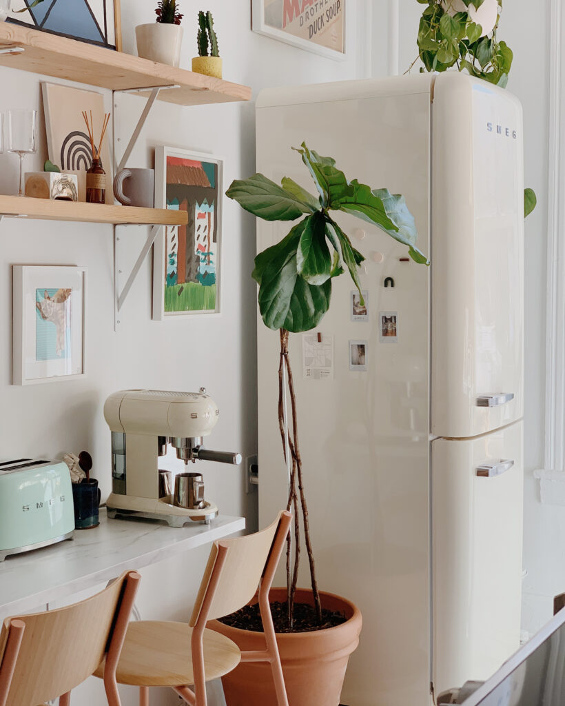 Beige Smeg fridge in and breakfast bar