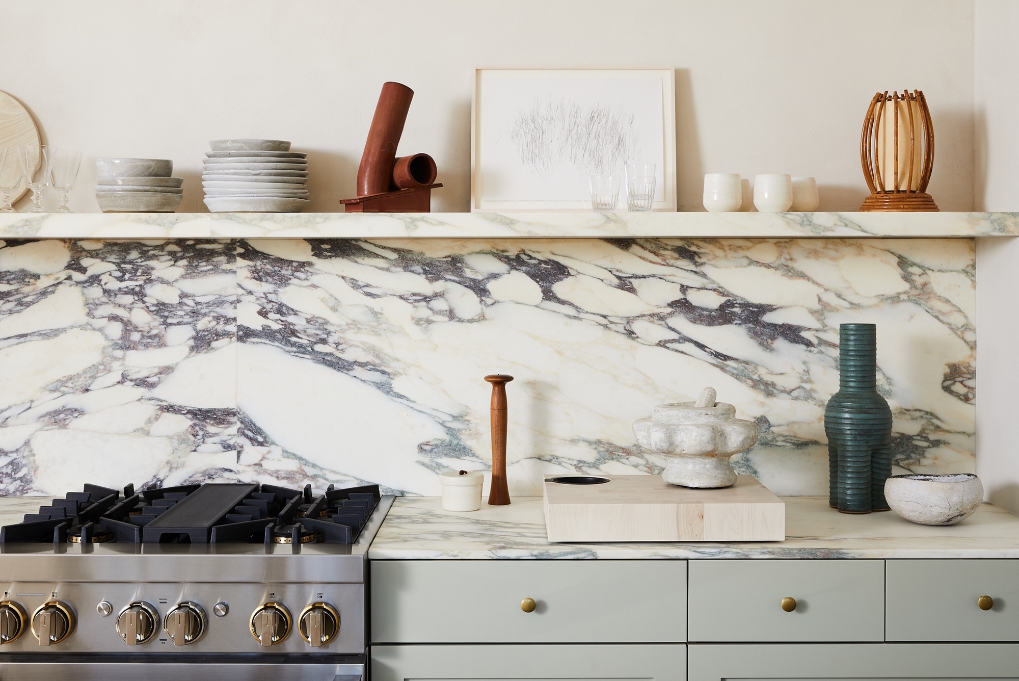 Marble countertops and backsplash by Athena Calderone