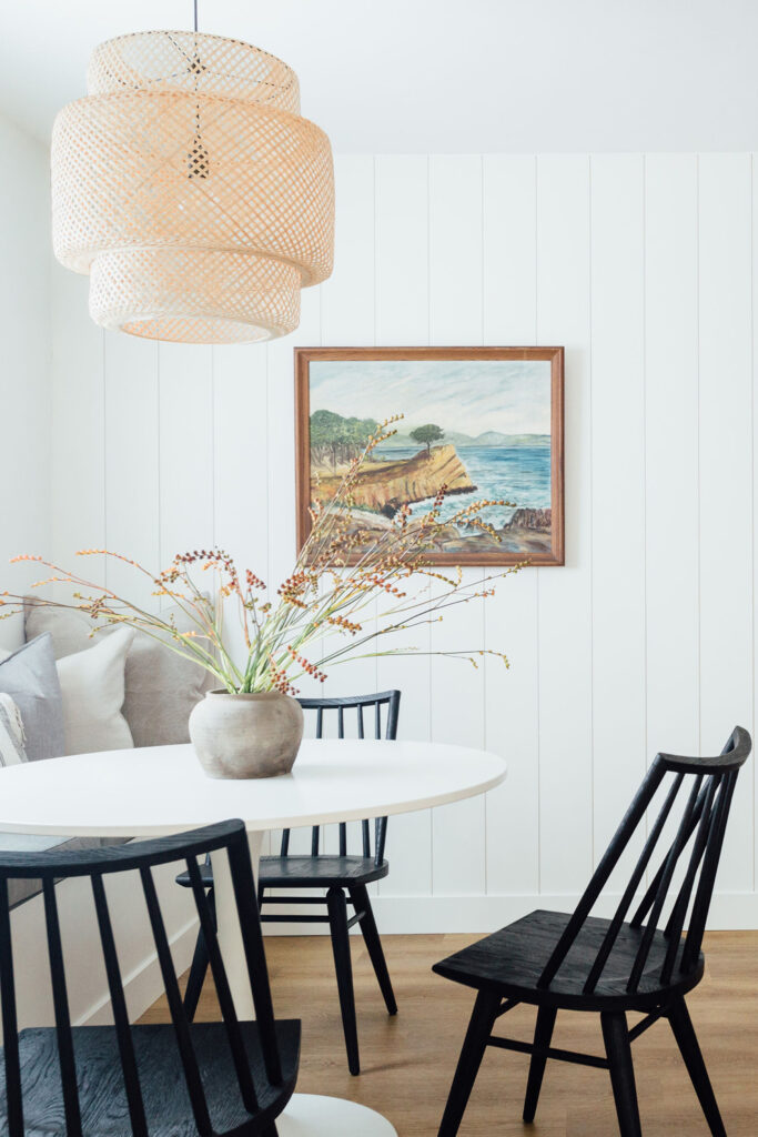 Dining area with white shiplap walls