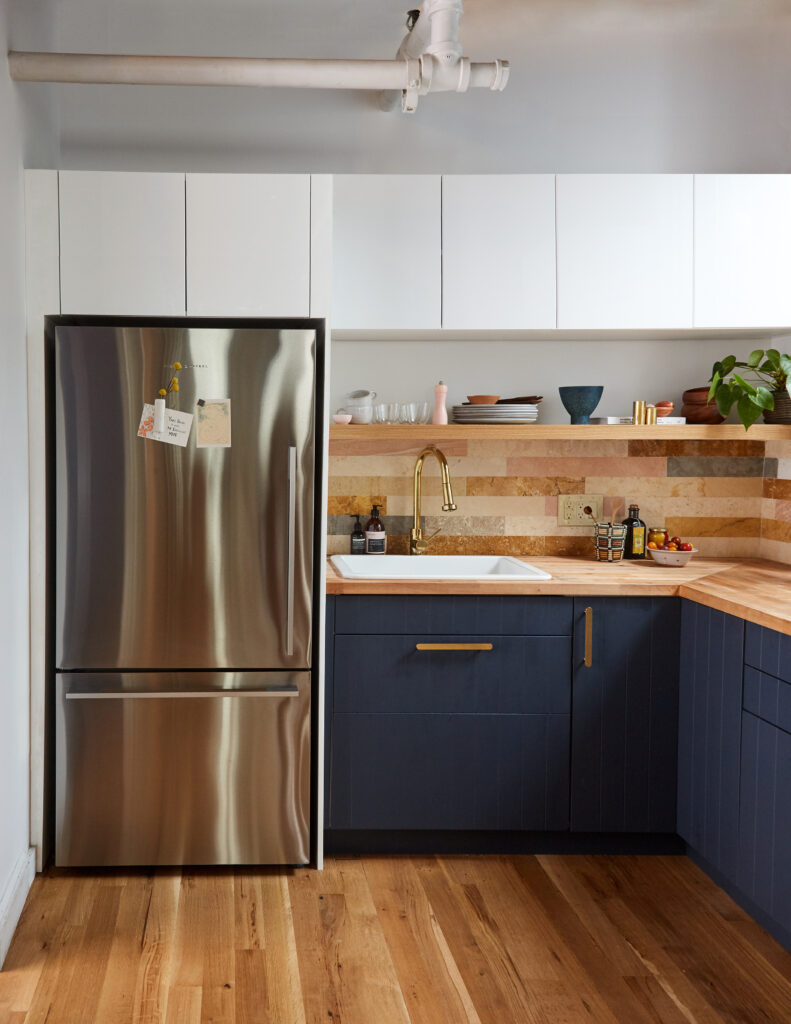 High Ceilings in This NYC Loft Meant One Couple Got Open Shelving and Upper Cabinets