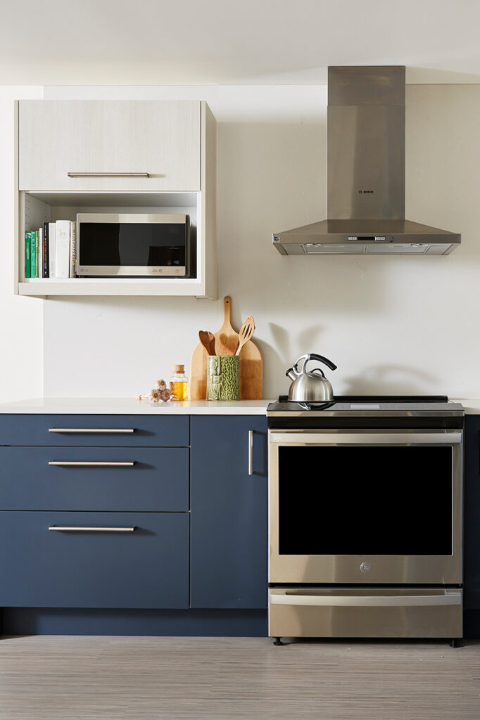 Blue and white wood kitchen cabinets