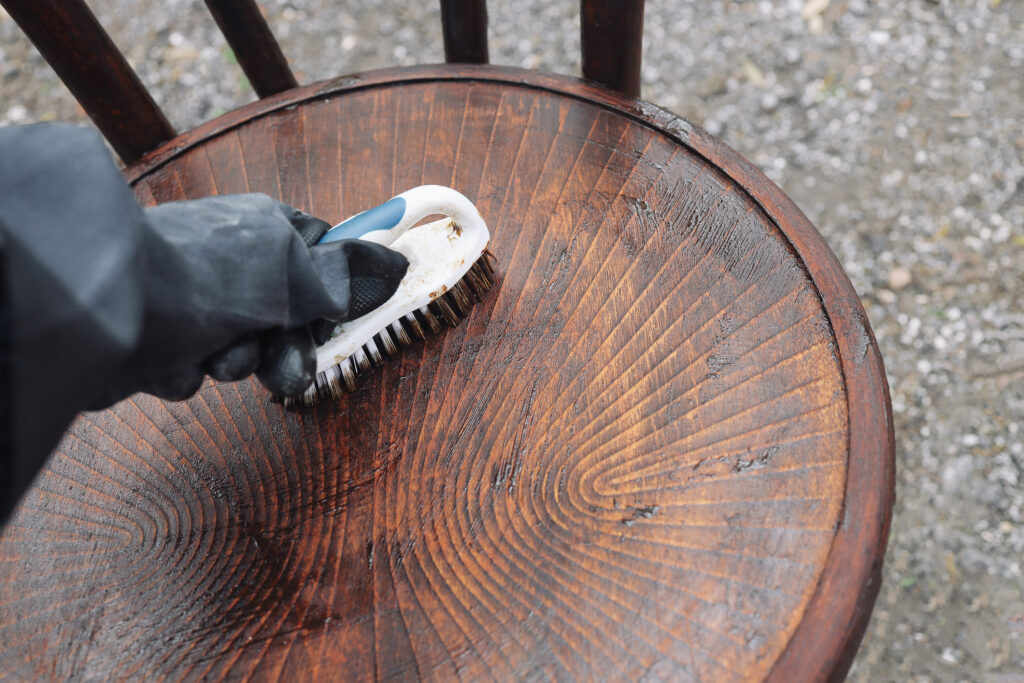 Scrubbing a wood chair