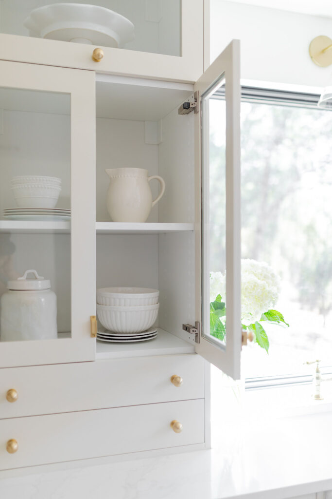 Glass front kitchen cabinets painted white