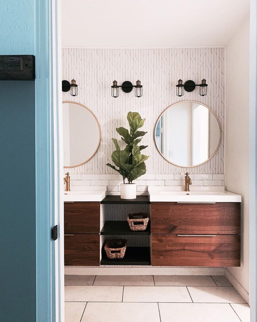 Walnut vanity in a white bathroom