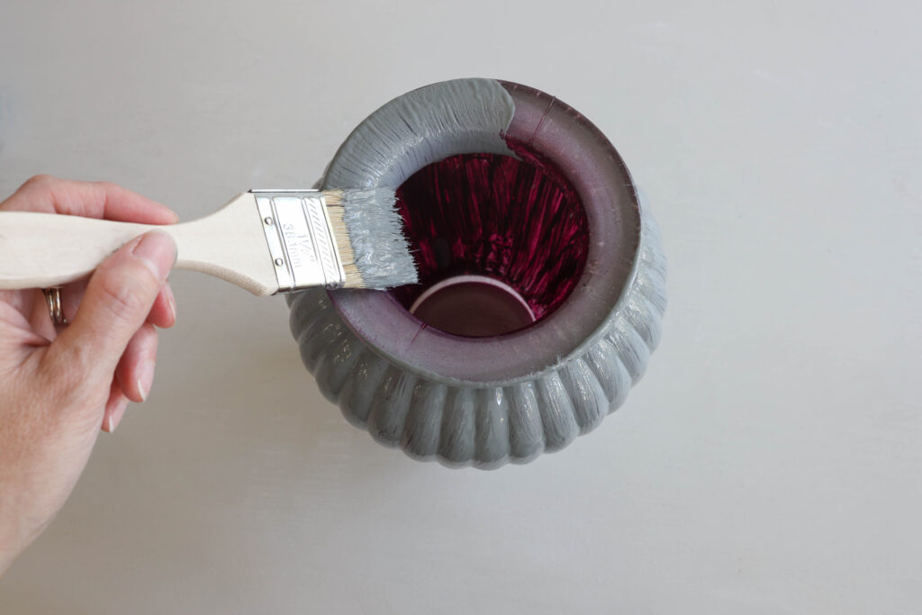 Painting the inside lip of a vase
