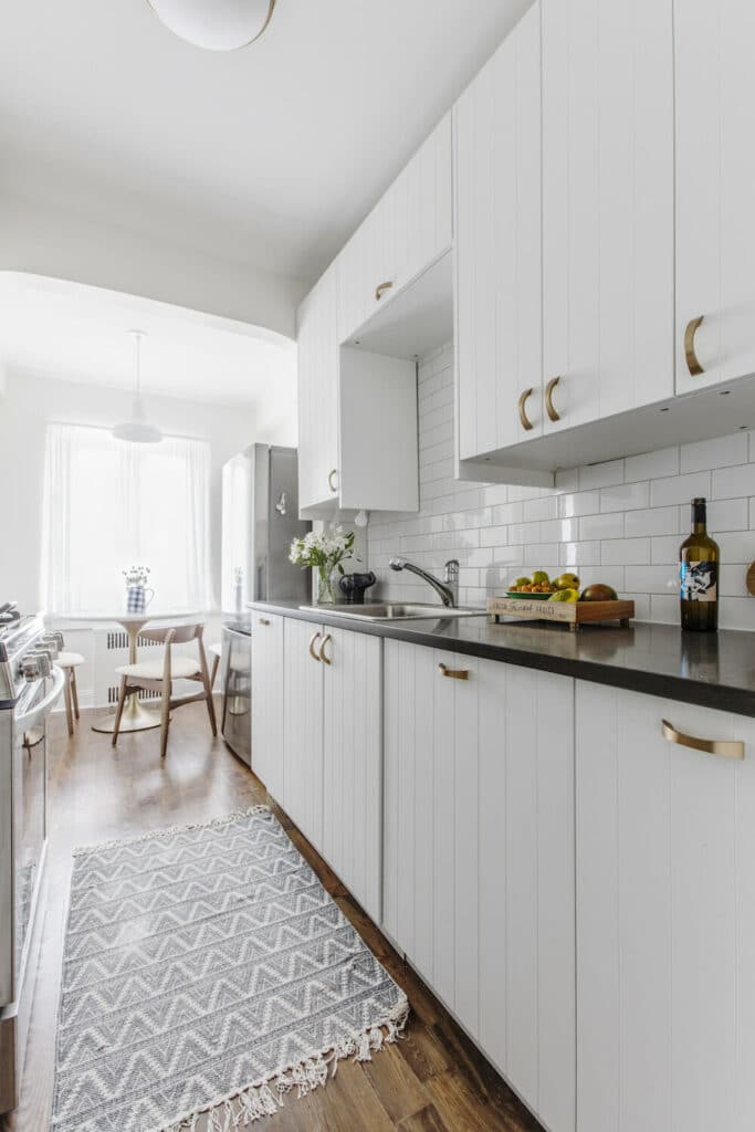 White beaded kitchen cabinets