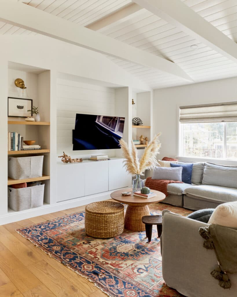 Living room white built-in credenza under television