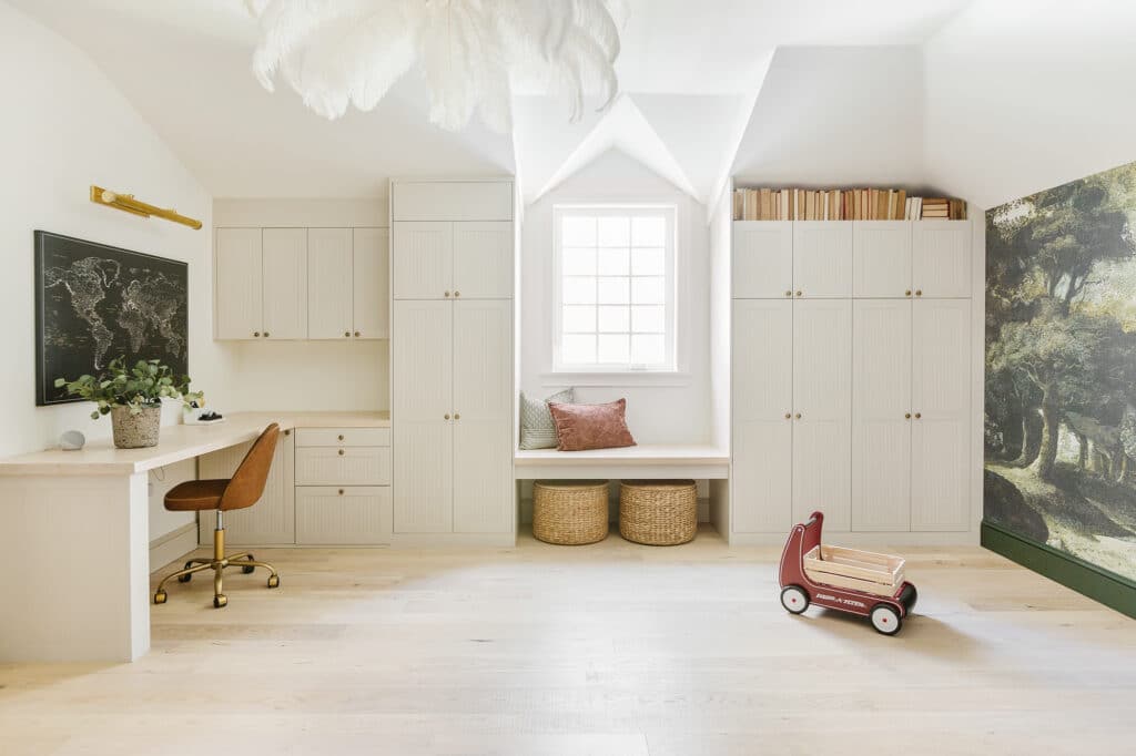 Beige playroom with green accents and built-in storage