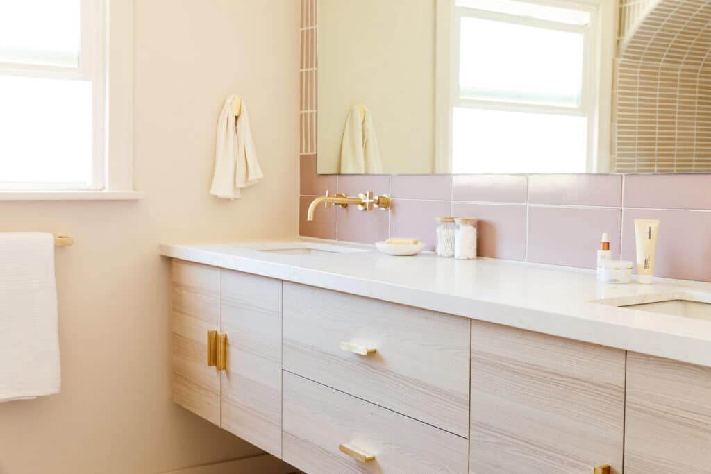 Bathroom oak floating vanity with brass hardware