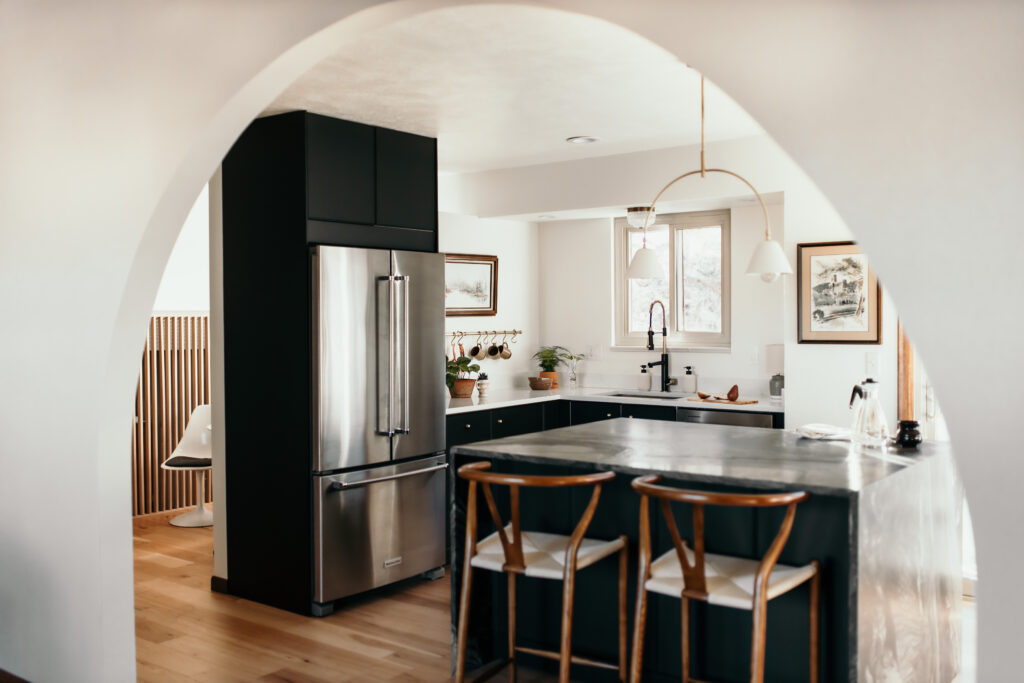 A Midcentury Take on the Classic Black-and-White Kitchen (With Hidden Storage)